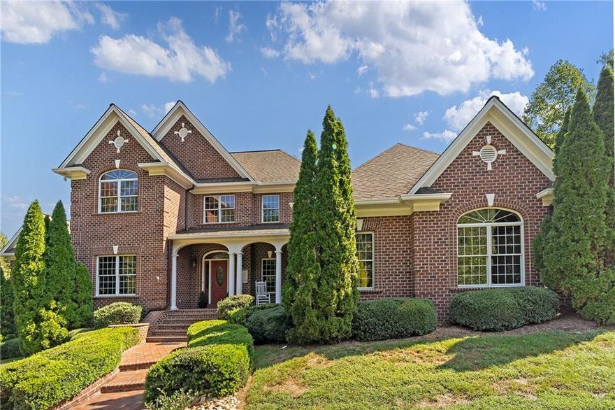 MOORE’S FERRY LAKE HICKORY NEIGHBORHOOD custom built utmost in design, quality and craftsmanship: 7,000 sq ft expertly crafted architectural details!  Voluminous rooms, high ceilings, hardwood, moldings, built-ins. Grand two-story foyer, formal dining & living/music room, den features wall of windows, FP w/ view of extended living area w/spacious brick deck extending onto a magnificent salt/water POOL/water falls/privacy landscaping w/gracious gardens.  Kitchen is state-of-the-art gourmet w/ lg center island, ample cabinets, granite, gas cook top, breakfast, sunroom. Master bedroom wing on main floor - spacious and accommodating – office. Upper level very spacious and accommodating with playroom, bedrooms, 2 baths, walk-in storage. Lower Level: complete kitchen, bedroom, 2 baths, rec rm,FP, family rm, access to backyard fun! .62 corner lot, circular drive, 3 car garage, parking galore. Cul-de-sac Street. Club House/Pool/Optional Boat Slips when available – Minutes to downtown Hickory.
