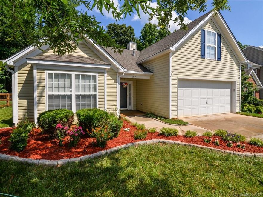 Sip coffee from your sunroom on your private, fenced and wooded yard or entertain in this open floor plan and cook like a pro in the kitchen which has granite counters, ceramic tile backslash, composite granite sink, GE slate appliances & gas stove. New wood and tile flooring on the entire first floor. Fresh paint throughout. New R410a refrigerant and hvac system. Newer water heater. Garage with built in shelving, pegboard wall and work bench. New garage door opener with bluetooth. Gas fireplace