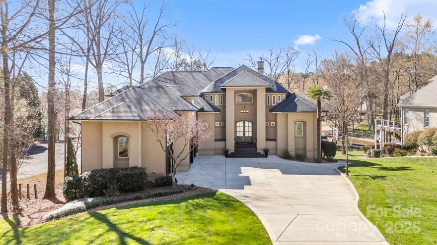 Experience the ultimate lakeside lifestyle at 8016 West Bay Drive, Denver, NC! This stunning waterfront home along the shores of Lake Norman offers stunning views, a private dock, cozy fire-pit under the trees, and beautiful upgrades throughout. Recently renovated, the home boasts a sleek newer kitchen, plush carpet in the bedrooms, and modern LVP flooring in the basement. Step outside to a brand-new upper deck with ample room for dining or soaking up the sun. With an open-concept design, expansive living spaces provide an abundance of natural light, an elegant primary suite on the main level, and fully finished walk-out basement this home is perfect for both relaxation and entertaining. The upper level includes 3 guest bedrooms, 2 full baths, and a huge bonus room with endless possibilities. All of this, just minutes from shopping and dining—don’t miss this rare opportunity for a slice of lakeside paradise!