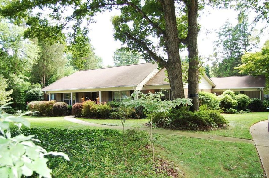 Custom ranch home in desirable Matthews with lots of charm!  Hardwood floors throughout, formal living ,dining, family room with fireplace . 2007 additions included huge master suite with his and her closets, master bath with dual vanity, large doorways, spacious laundry with lots of cabinets and counter space. Private access to screen porch from master suite. Magnificent backyard with in-ground pool and spa. Additional living quarters over 700 sq.ft Cottage with bd/ba perfect for mother-in-law.
