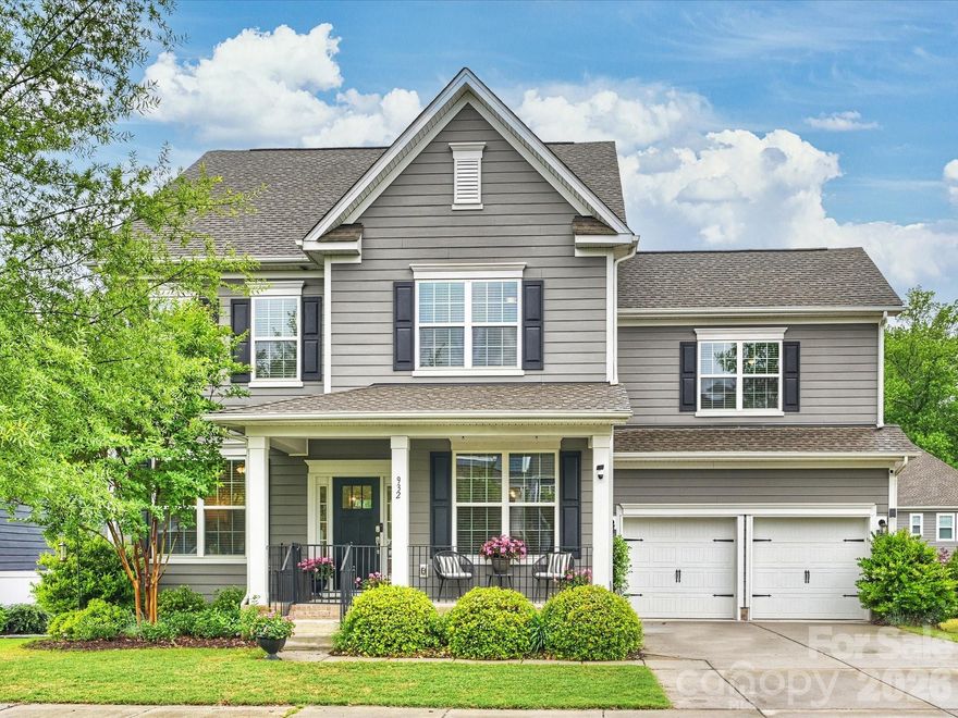 Completed in 2021, this light-filled 5BR/4.1BA home combines modern upgrades with a prime location just minutes from historic Davidson and Lake Norman. The 3,178 sq. ft. open-concept layout is thoughtfully designed, featuring a private home office with French doors and the rare advantage of dual primary suites.
The chef’s kitchen serves as a culinary focal point, boasting double ovens, a gas range, and an expansive quartz island that overlooks the spacious great room and fireplace. For outdoor relaxation, choose between the elevated screened porch or the patio below, both offering views of the fenced, manicured backyard.
Upstairs, the primary retreat features a spa-like bath and an expansive walk-in closet. The second primary suite offers exceptional flexibility, serving perfectly as a guest sanctuary or a luxury bonus room. Residents of Westbranch enjoy resort-style amenities and direct access to the Davidson Greenway system and Plum Creek Park, all within a top-rated school zone.