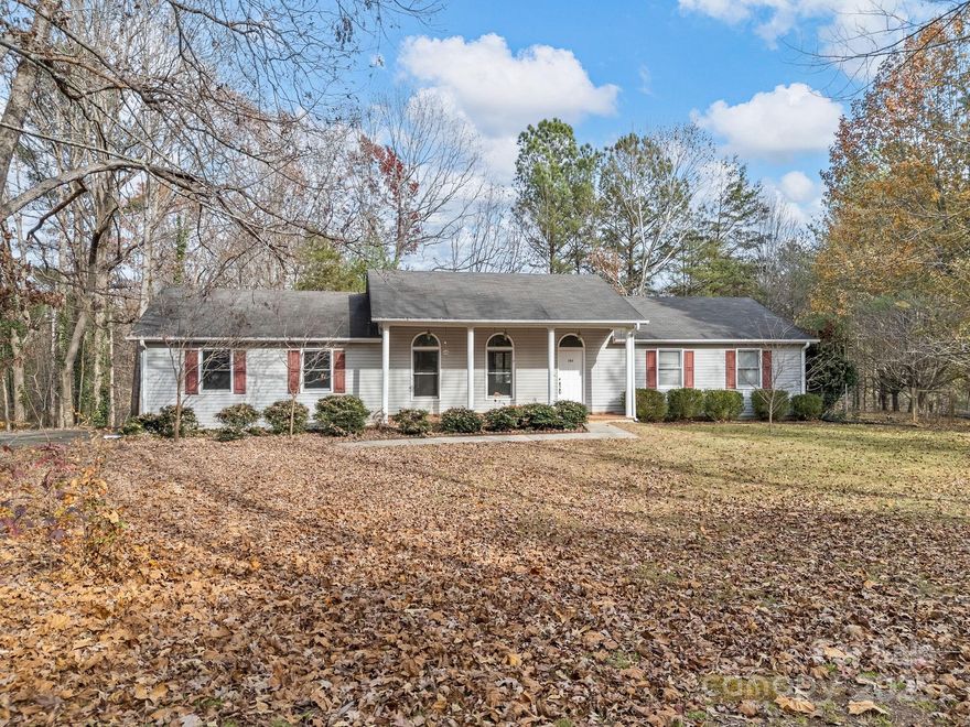 3 Bedroom, 2 bath, home built in 1996 with 1.10 acre lot in a small subdivision Woody Circle in horse country off Peniel Road. Home has a living room with a high ceiling and gas log fireplace, the dining room has a bay window and the huge unfinished daylight walkout basement as well as inside access is ready to become an additional living space, a playroom or whatever the next owner dreams of having. Lot has a fenced dog yard and a large level area with mature trees adjoining the covered front porch. Seller to give $10,000 allowance for updates.