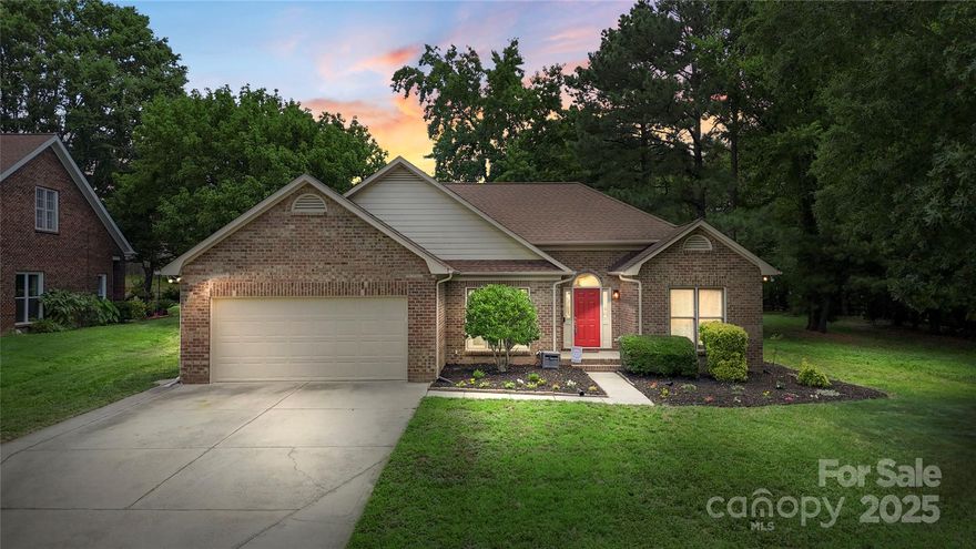Welcome to this charming ranch home in the desirable Winghurst neighborhood! This 3-bedroom, 2-bathroom home offers a light filled floor plan with engineered wood flooring in the main living areas, large windows plus skylights for extra light, and a cozy fireplace. The kitchen features abundant cabinetry and countertop space, stainless steel appliances, and tile backsplash. The dining area is conveniently located close to the kitchen for quick and easy access. The spacious primary suite includes tray ceilings, a walk-in closet, and a tiled ensuite bath with a dual sink vanity, soaker tub, and separate shower. The generously sized secondary bedrooms offers a great flex space if needed. Enjoy outdoor living on the covered, screened-in back porch overlooking the fenced, large and flat backyard—perfect for relaxing or entertaining. This home combines comfort, functionality, and space in a great location with easy access to Ballantyne, 485 and I77!