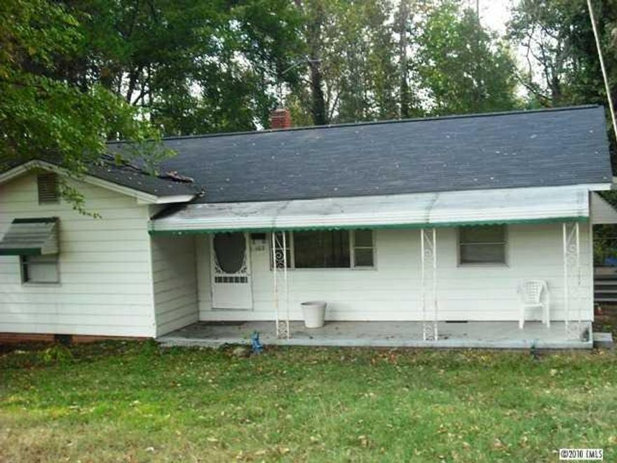 Investment property or home for first time buyer on 1.4 acres (2 lots).  Buyer's agent to verify anything of importance to buyer.