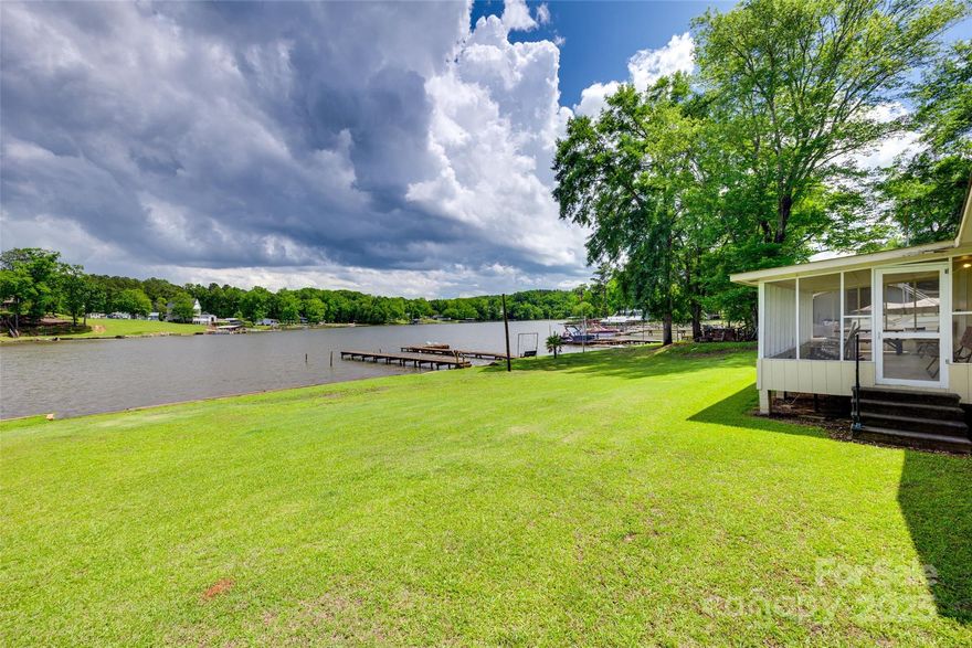 Rare opportunity to own a beautiful waterfront lot in the highly sought-after Beaver Creek area of Lake Wateree! This open, gently sloping lot offers gorgeous views and direct lake access with an existing private dock already in place. The property features one of the original lake shacks—rustic but usable, with potential for renovation or removal to make way for your dream lake home. Whether you're looking for a peaceful weekend retreat, a fishing getaway, or a scenic spot to build new, this property has endless possibilities. Don’t miss your chance to own in one of the most desirable areas on Lake Wateree!