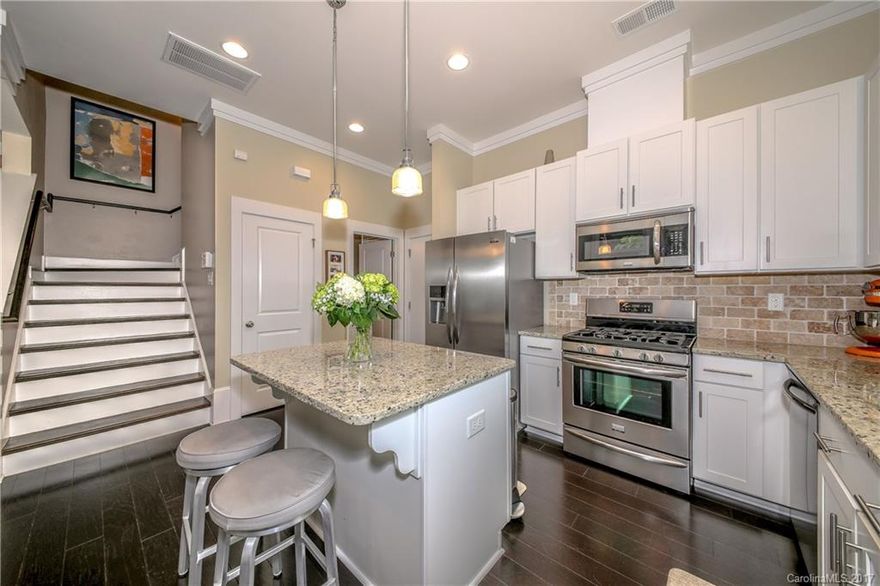 Well appointed end unit in desirable new section of Steel Gardens in NoDa. Completed in 2015 with engineered hardwood floors throughout all 3 levels, white kitchen cabinets, stainless steel appliances, premium light fixtures, California Closets, Smart thermostats, and Synlawn Pet Premium turf.  This home has two outdoor spaces and has been meticulously maintained! All of this with only a short walk to all the restaurants, breweries and nightlife that NoDA has to offer.