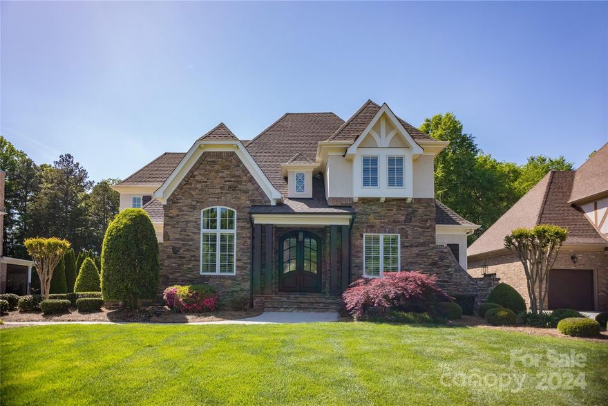 Every luxury you could wish for are found in this custom-built home by Artisan Homes. The newly
updated kitchen is a chefs dream with marble counter tops, 2 islands, 6 burner range, 2 dishwashers, 3
ovens, wet bar, icemaker, Subzero/Wolf appliances. The dining room, with its stunning wall mural by
local artist David Merck, is true elegance. Retreat and relax in the private oversized primary suite with
sitting room and fireplace on the main floor. 2 offices, music room, family room, laundry, dining and
den complete the main floor. Impeccable high-end finishes & architectural details throughout this
home. Oversized 3 car garage with custom cabinets and finished floors. The private backyard features a
veranda, covered built-in grilling area, fire pit, new oversized inground custom pool and hot tub
surrounded by limestone pavers, lush landscaping and a putting green! The home is steps to the Davidson Greenway for walking or biking.