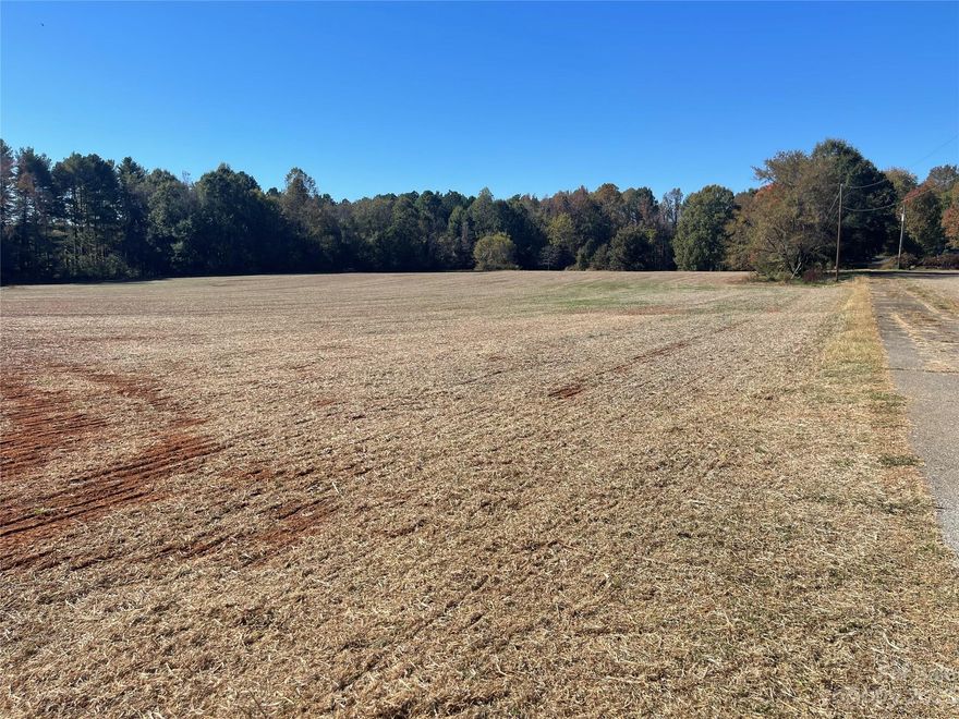 Beautiful level, cleared lot for your custom home in the heart of picturesque Mt. Ulla, just a few miles east of Mooresville and Lake Norman.  No HOA, but restricted to site built homes only.  That hard to find small acreage for your home, pool and shop, or your own hobby farm!  Lot 3 of a proposed division of 22 acres approx.  Lots can not be subdivided further once purchased. Barndominiums allowed, mini-farms, etc.  Minimal restrictions.