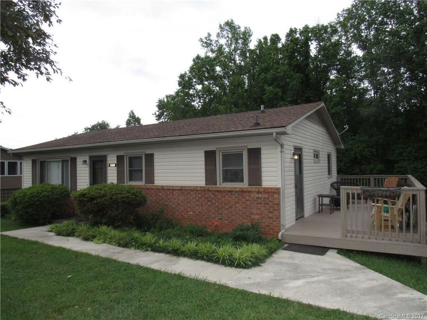 Well maintained 3 bedroom/2 bath home only minutes to Walmart yet in peaceful country setting. This home has been well loved by its current owners for almost 40 years but the time has come for new memories from new owners to be made. This home features an airy kitchen w/eat in dining, living room, 3 bedrooms and a bath on main. Downstairs is a finished family room/man cave, a bath (finished not heated not included in sq ft), pantry, and workshop. Basement could easily be finished.