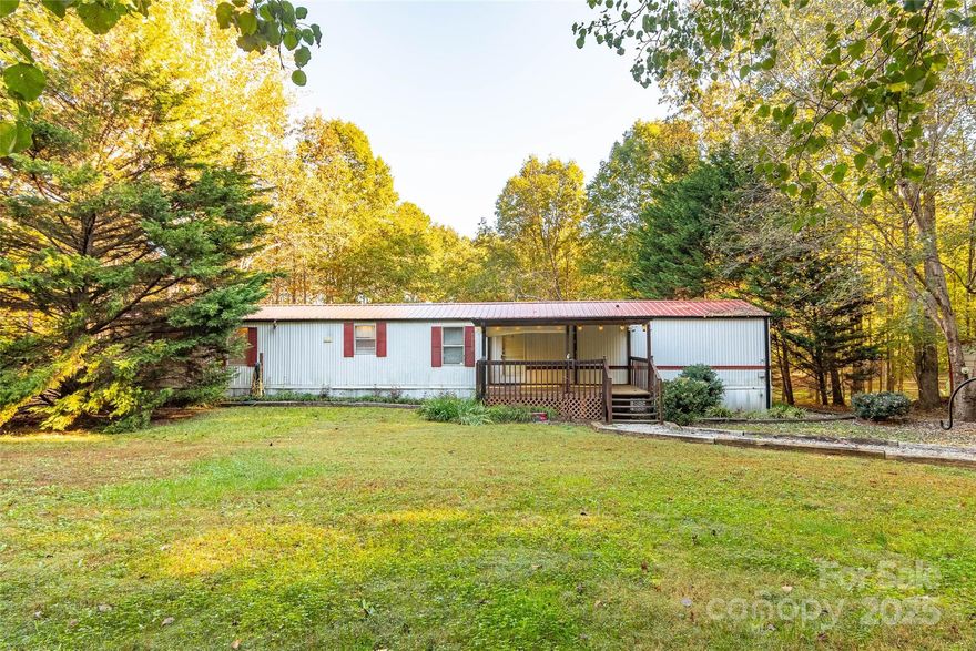 Enjoy peaceful country living just minutes from the South Carolina line! This well-kept, 3-bedroom, 2-bath Fleetwood single-wide manufactured home sits on a spacious 1.50 lot. The large backyard shaded by mature trees making it perfect for outdoor gatherings, gardening, or simply relaxing in nature. The property features a 2-car metal carport for covered parking and a detached garage with concrete floor and power that would make an excellent workshop, hobby space, or extra storage area. There is also an RV outlet in the side yard for RV parking. Conveniently located approximately 20 minutes to Gaffney, SC, and 20 minutes to Forest City, NC, this property offers easy access to shopping, dining, and major highways. Whether you’re looking for your first home, an investment property, or a weekend retreat, this one has plenty of potential!
