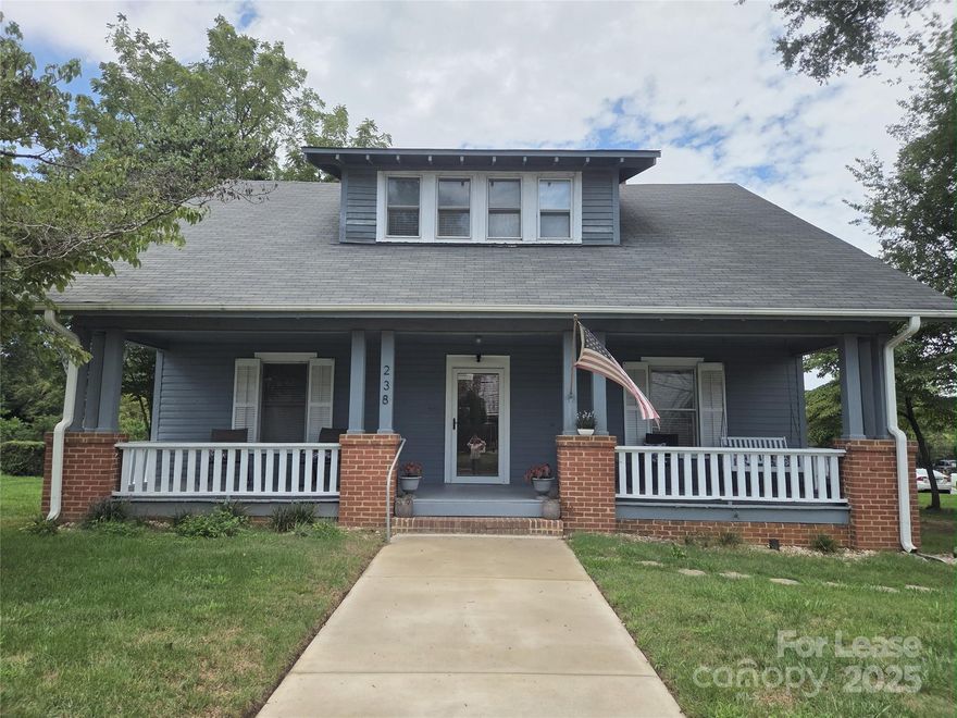 Step into timeless charm with this beautifully renovated 1911 single family home, where historic character meets modern updates. This top floor unit includes two bedrooms, one full bath, a huge walk-in pantry, open concept, gas range, LVP flooring, granite counter tops and more! Nestled just steps from downtown Davidson, you will get to enjoy the convenience of the local shops, dining, and community events all within a short walk. Don't miss the opportunity to live in one of Davidsons most desired locations!!