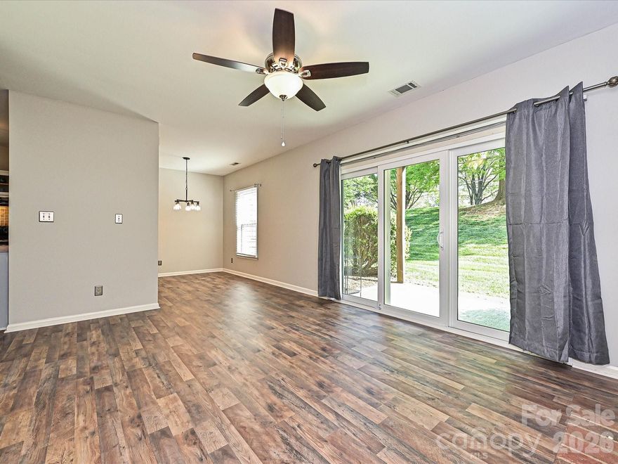 This is it! The move-in ready ground floor, one level condo you've been waiting for. With new flooring, fresh paint, new windows, new sliding glass door, new carpet, updated vanity, and updated light fixtures -- this charming condo offers the best of both worlds: tranquil neighborhood living just minutes from South End, Uptown, Park Road Shopping Center, and more.

The layout is ideal with the spacious bedroom - complete with walk-in closet - connecting conveniently to the bathroom, which features dual access from the bedroom and the hallway. Across the entry hall, you'll find a coat closet and a true laundry room with shelving providing additional storage. The kitchen flows nto the dining and living areas, where built-ins and a cozy fireplace add charm and character. From there, sliding glass doors open to a covered patio, perfect for enjoying fresh air on sunny spring days. The community pool is perfect for a refreshing dip on the hot summer days.

With no rental cap, this property is a fantastic opportunity for homeowners and investors. Don't miss your chance to own this wonderful condo in one of Charlotte's most coveted locations.