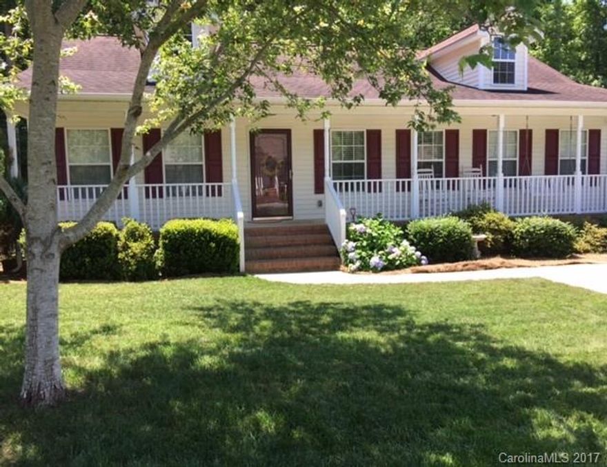 Beautiful Ranch Style w/ 3BR & 2BA near Historic Downtown FM in popular Fort Mill School District!  Great Room w/ Vaulted ceiling, fire place, TV niche, and hardwood floors.  Tray ceiling in MBR w/ private bath. Arch entrance to dining room, opens to kitchen. Large front porch & back deck w/ fenced in private backyard that backs up to wooded area.  Alarm system. Window blinds & kitchen appliances to remain, except the refrigerator.  Owner will take washer & dryer. A well cared for home!