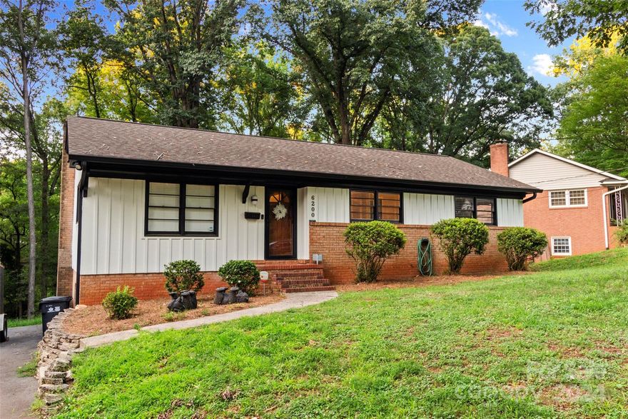 **Open House 2pm-4pm Saturday 9/21/24** Come experience this tastefully remodeled home in the well established. Starmount Community.  6200 Candlewood is an all brick, 4 bedroom 2.5 bathroom that sits on .38 acres. Chefs dream of a kitchen with a large island, Spice rack, under cabinet lighting and high-end gas range. Primary bedroom on the lower level as well as main floor!  Lower level primary suite offers walk-in-closet as well as updated bathroom with tiled shower. Large laundry room with built in cabinets. Extensive rear deck that overlooks the large rear yard.  Don't miss the work shop! Great community close to the city yet still private enough for afternoon walks.  located near Montford, SouthEnd and everything South Park has to offer.  NO HOA.