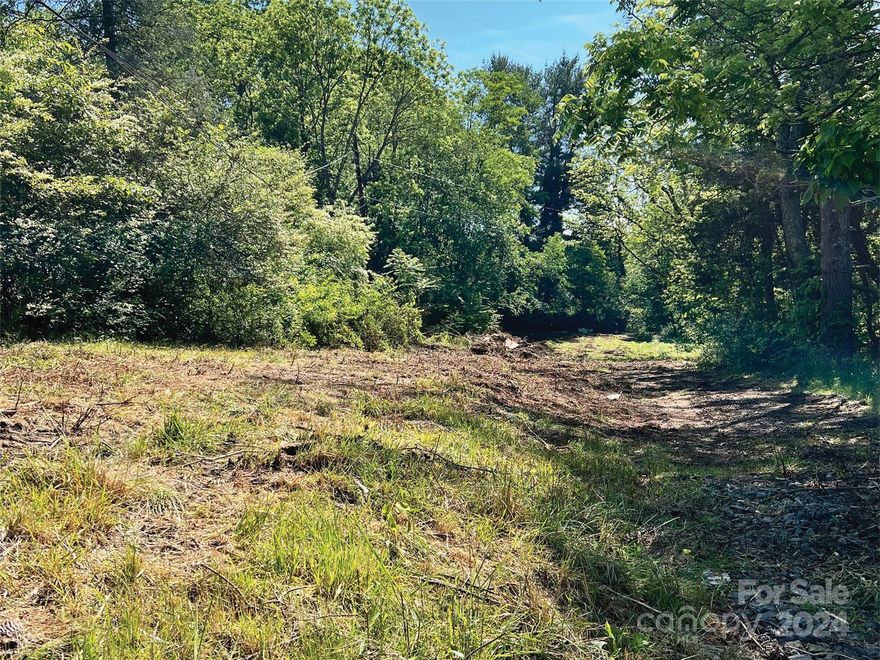 This is a prime level lot in the heart of west Asheville. A wonderful opportunity located within one mile of desirable Haywood Rd. Enjoy all the conveniences this location has to offer. Please have buyers agent verify all building plans with the City of Asheville.