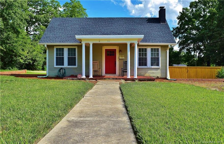 Your dream home is here! Meticulously renovated while paying homage to the original architecture from gorgeous moldings to original hardwoods.Updates include massive tiled shower,stone surround on gas log fireplace,and privacy fencing and storage building in the backyard.I could go on and on, but you need to come see this to be truly delighted.