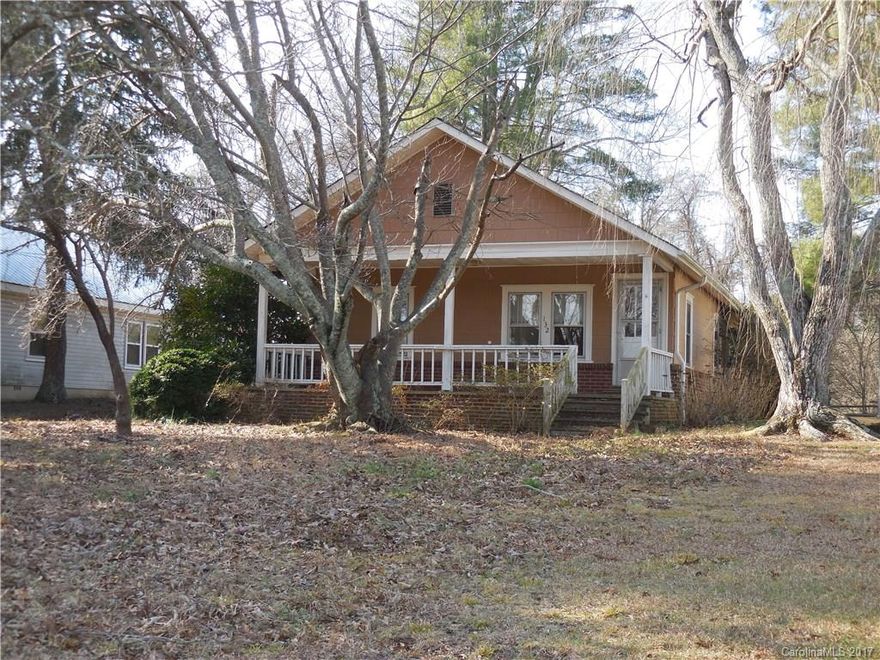 If you appreciate the era when houses were built by craftsmen, you're going to love this beauty.  Three bedrooms, one bath, large kitchen and living room...and a perfect rocking chair front porch.  But, move quickly...a home of this quality and location, that's available for less than one hundred thousand dollars, will not be available very long.  The back yard has a split rail fence on 3 sides.  This home is being sold as is.  Come make it your own.