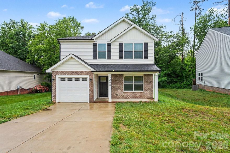 Move-in ready four-bedroom, 2.5-bathroom home with an attached one-car garage in the mature and peaceful Mayfair neighborhood. This charming home welcomes you with an open floor plan that creates a seamless flow throughout, featuring a nice living room that flows beautifully into the rest of the main living spaces. The interior is finished with a mix of vinyl/laminate and carpet flooring. The updated kitchen serves as a stylish heart of the home, boasting elegant granite countertops and modern stainless steel appliances.

Designed with convenience in mind, the layout includes a dedicated laundry room located on the first floor. Outside, you can enjoy the outdoors from both the welcoming front porch and the back deck. The primary suite offers a private retreat, complete with its own attached primary bathroom and a large walk-in closet.

The location is a standout, offering the perfect blend of suburban tranquility and easy access to local essentials. Situated just minutes from I-40 (Exit 133), the property provides an easy commute to both Hickory and Statesville. Residents will enjoy being near local favorites like the RockBarn Country Club and Conover City Park, all while benefiting from the privacy of a mature neighborhood with city utilities. Schedule your private showing today!