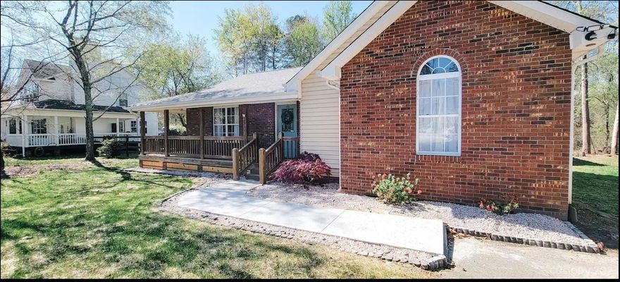 This 3 bed, 2 bath single-story ranch home is ideally located on a dead-end street, just minutes away from public lake access on Lake Norman and the Westport Golf Course. Home is a short term rental and grossed $30,000 in 2023, Furniture is negotiable, some 2024 bookings already in place if you chose to continue renting it out! 

Step into the inviting living space adorned with hardwood floors, creating a warm and welcoming ambiance. The kitchen and bathrooms have luxury vinyl plank flooring. Bedrooms all have newer carpet, with the spacious master bedroom featuring a walk-in closet & ensuite bathroom complete with dual vanities and a convenient linen closet. Enjoy the serenity of a level lot with fresh landscaping, providing a perfect canvas for your personal touch. The detached garage, equipped with power, offers versatility as additional storage space or a potential workshop.