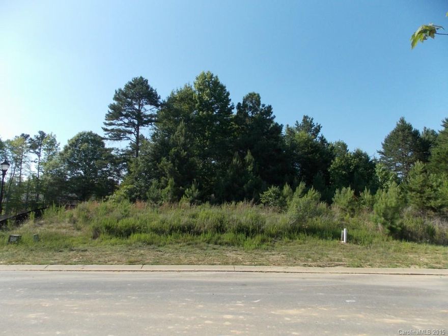 Excellent opportunity to purchase a vacant lot in Cureton to build your custom home.  Cureton is an established community in a Top Rated School District that offers swimming pools, fitness center, walking trails, playground, and a terrific clubhouse.  Enjoy this quiet location that is convenient to shopping, restaurants and historic Main Street.