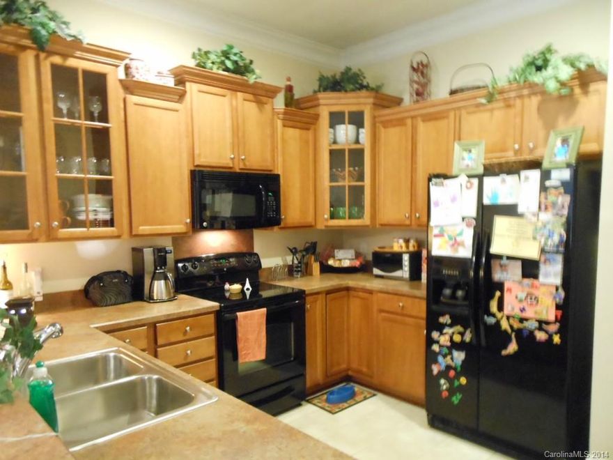 Walk to Cannon Memorial YMCA from this great townhome with front brick wall/metal gate patio and attached rear garage. $2500 credit offered by seller for buyer costs at closing or decorating allowance. Mostly brick with vinyl siding. Move-in ready. Carpets recently cleaned. Crown moldings. Easy access to I-85 and amenities. Wonderful kitchen. Built-In bookshelves upstairs. Rental not permitted at this time per HOA. HOA dues are $175/QTR for Savannah Row Townhomes and $60/Qtr to Afton Village.