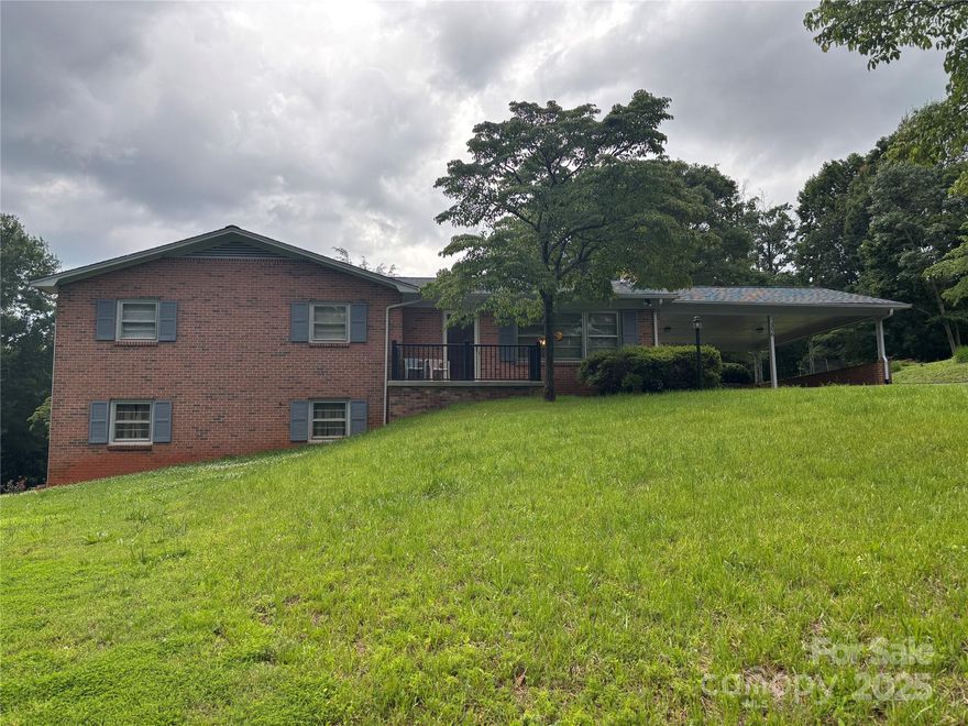 New heat pump system, new roof, new interior painting, new front patio & railing, and a new asphalt driveway is some of the recent updates.  Own a piece of Heaven in the foothills of Alexander County.  This is a rare find in the Bethlehem community which is a great place to live, has a wonderful school district, and located close to Lake Hickory and close to Wittenburg Landing with a boat access and recreational area. This charming ranch style house sits on a large 0.741-acre lot, has a full basement with many possibilities to expand the living area, three bedrooms, two bathrooms, a large two car carport area with a connecting concrete pad for all your outdoor entertaining. The interior features two brick fireplaces and hard wood flooring which is just a few of the qualities in this house. This is a one-of-a-kind property and close to everything.  Dishwasher does not work.  Sellers are selling as is.