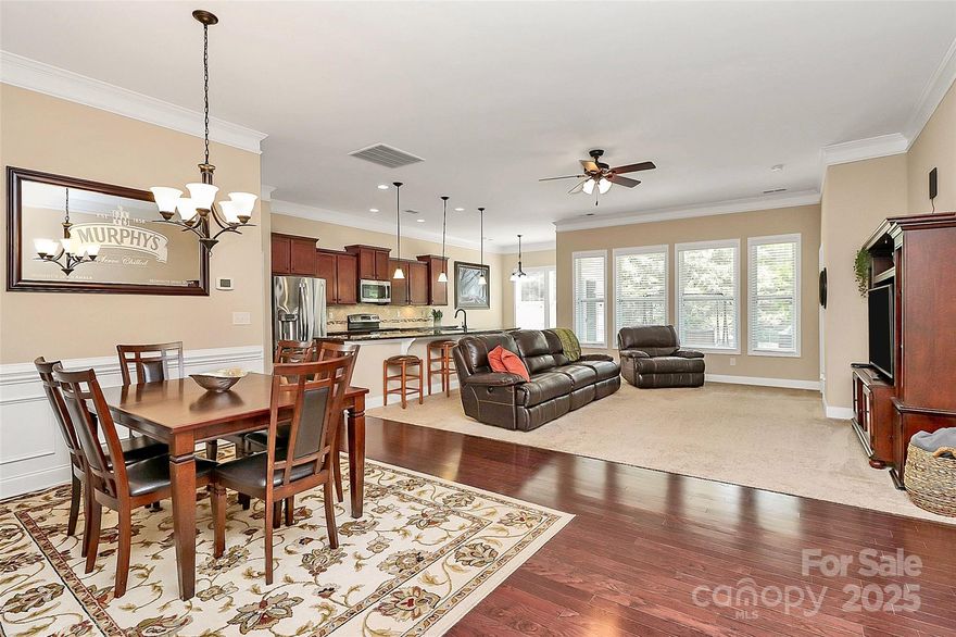 Welcome home! This beautifully maintained 4-bedroom, 3-full-bath home offers 1½ stories and a spacious, wide-open floor plan. The oversized owner's suite is on the main level, with a versatile bonus room, bedroom, and full bath upstairs—perfect for extra living space, play, or relaxation. The large kitchen features a huge island with ample seating, abundant storage, and an eat-in breakfast area! Step outside to your private backyard oasis with wooded views, a custom paver patio, and a covered patio for enjoying afternoon rain showers. Beautiful flower beds are filled with perennials for low-maintenance, year-round color.

Enjoy all Timberlake has to offer, including a neighborhood pool, walking trails, and a playground. You're just minutes from the upcoming Harris Teeter, the Clover YMCA, and Field Day Park with pickleball courts and more. Lake Wylie is only 2 miles away—perfect for weekend adventures!

See why this Lake Wylie area is the new frontier for peaceful-easy living!