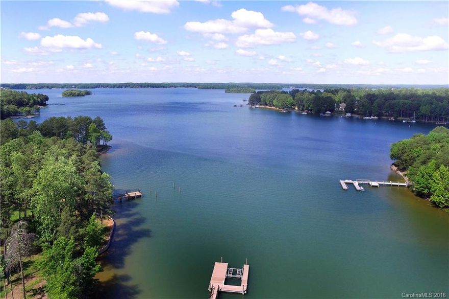 Beautiful, cleared WF lot with wide open views of Lake Norman. Boat slip, lift & seating area already in place.   Cul-de-sac lot, with sunset views, perked for up to 5 bedrooms!
