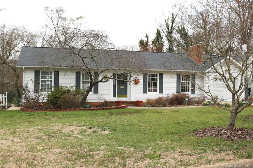 Charming home on tree lined street. Lots of space in home to spread out. Wood floors on most of the main level. Second living quarters in walk-out basement. A garden lovers home with mature landscaping front and back. Wood burning fireplace in living room. Second living quarters has separate entrance and potential for income production.