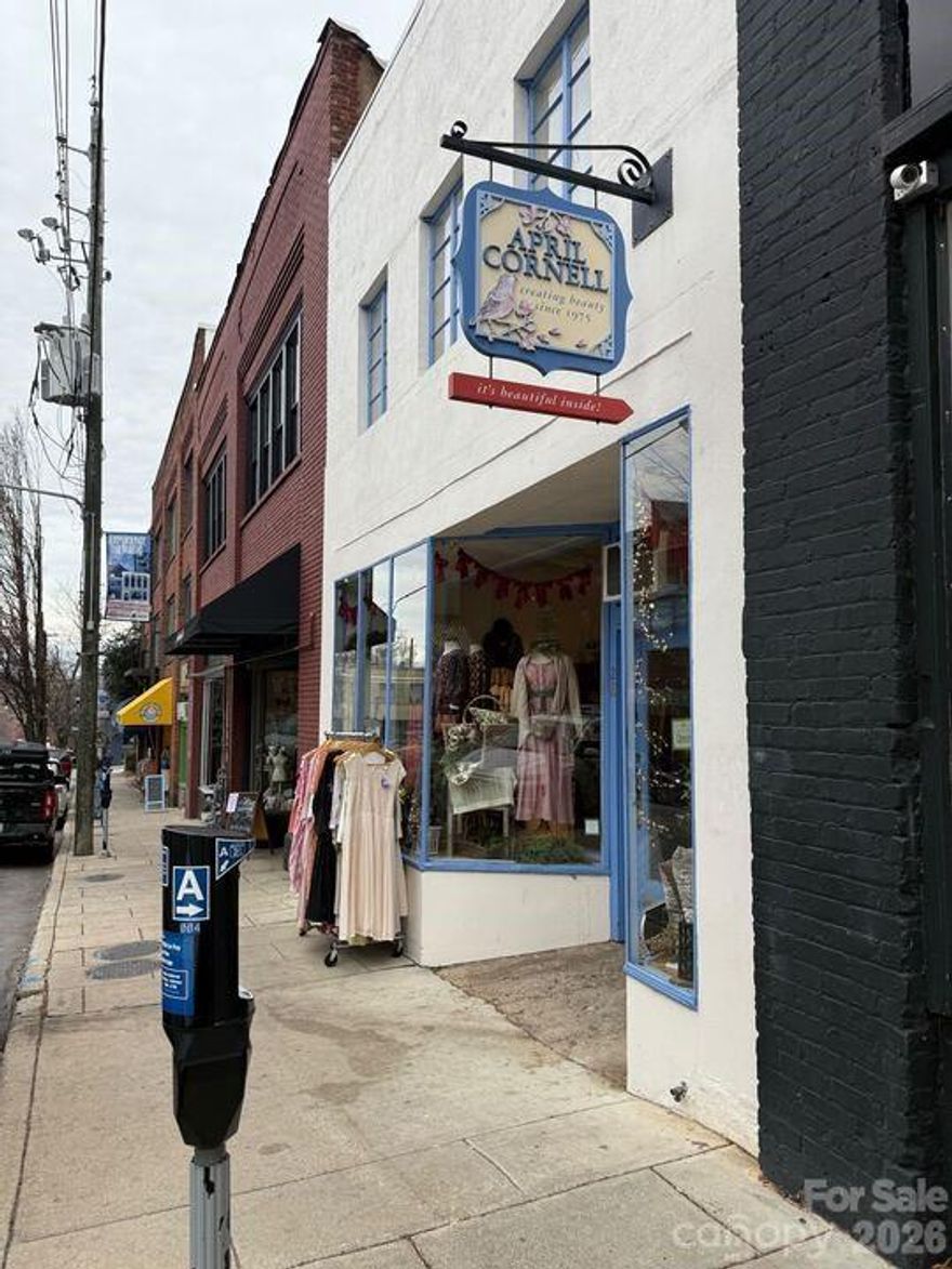 Boutique Downtown Residential & Retail Duo combining street-level retail
with upper-floor residential unit on Lexington Avenue and Tingle Alley.

Positioned in the heart of downtown Asheville’s vibrant Lexington Avenue district, 28 N.
Lexington Avenue and 7 Tingle Alley present a rare opportunity to own a true live/work
property in one of the city’s most dynamic corridors.

Ideal for owner-operators, the property offers the ability to live just above your business—
creating a seamless lifestyle rooted in the energy of downtown—while also providing the
flexibility to generate income from either level. Whether you choose to occupy the upper
residence or lease it, the layout supports both personal use and long-term investment.
The street-level retail space is fully leased, delivering immediate, stable income, while the
character-rich residential unit above presents additional revenue potential or a unique
opportunity for an owner to establish a presence directly within their business footprint.
Surrounded by Asheville’s most active dining, arts, and retail destinations, the property benefits
from consistent foot traffic and strong local demand—positioning it as both a lifestyle asset and
a smart income-producing investment