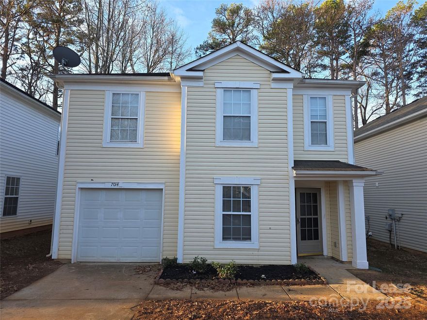 Check out this spacious 4 Bedroom 2.5 Bath Two Story home near Lawyers Road & WT Harris.  The interior has new luxury vinyl plank flooring installed throughout and renovated kitchen with new cabinets, granite countertops, large Island and Stainless-Steel Dishwasher, Electric Range, & Side by Side Refrigerator.  The house has gas heat and central air.  There is a large pantry storage area located between the garage and kitchen for easy access.  Lower level has a living area, large open den/dining area which leads to renovated kitchen with sliding door access to rear patio.  The upper level has 4 bedrooms and a common Rec room.  Washer dryer location is conveniently located near the bedrooms in a utility room.  Don't miss out on this well-appointed property.