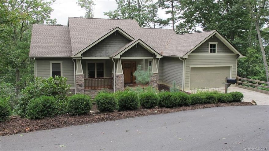 Beautiful Arts & Crafts-style home w/vaulted ceilings and fantastic long range mountain/valley views. Terrific lot in a fabulous walk-able community, priced to sell. Minutes to downtown Asheville and hopping West Asheville.  Large kitchen, upgraded appliances w/plenty of storage. Master on main w/dual closets & large shower.  Lower level has a tremendous unfinished basement to expand (could double) size of home and potentially increase value.  Double garage provides plenty of storage/parking.
