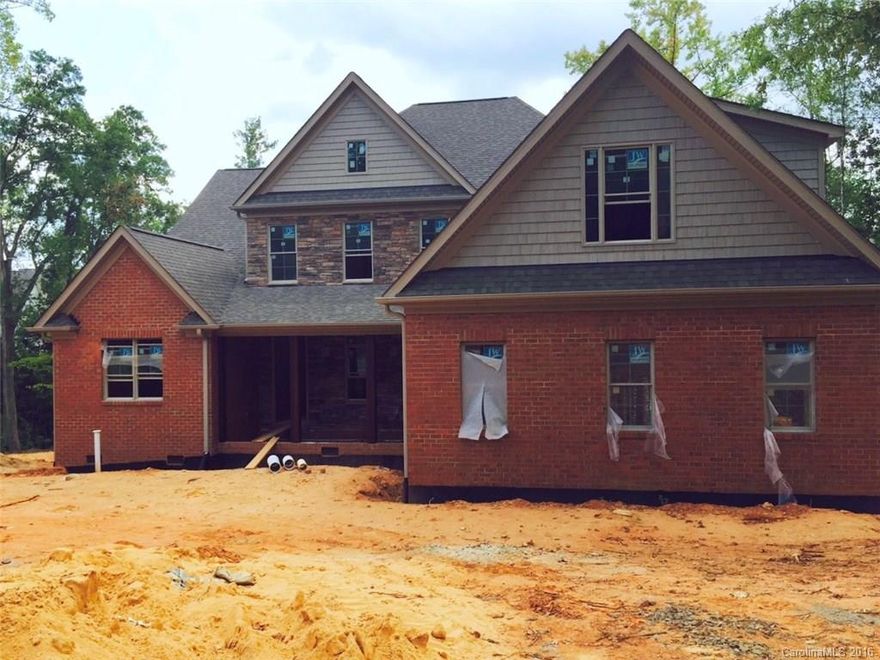 Exquisite new construction custom “ranch” home w/TWO Guest Suites on Upper Level w/spacious optional Bonus Room/amazing unfinished storage! Nestled on beautiful setting in prestigious Stanton Heights moments to Uptown & Ballantyne! Master & Guest Suite/Study on main. Wonderful Keeping Room/Kitchen/Breakfast flow! Open & airy, private covered porches, 3 car garage. Exceptional tile work, granite, extensive site finished hardwoods. Bike to pool, school, & Greenway.