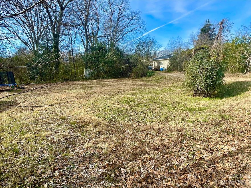 Here is your RARE opportunity to own a nice-sized lot for your dream home in a growing, revitalized area of Belmont. Affordability year after year with no HOA! The lot is largely flat, has a slight slope and a small creek towards the back of the property line. Multiple new builds in the surrounding area. Less than a 2 minute drive to historic downtown Belmont. The former home was removed/cleared years ago per seller. Measurements according to tax records. City water/sewer available per owners. Agent has a call in to City of Belmont to verify. Buyer to verify exact property lines and all pertinent information. Quickly, come see if this is your perfect place to call home!