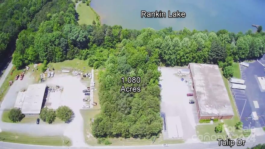 1.080 acre wooded Industrial lot available for your development needs. Power, water, and sewer nearby on tulip drive (taps required). Backs up to Rankin lake. To develop lot, confirm needs with Gaston County. This lot is a blank slate for your industrial needs.
