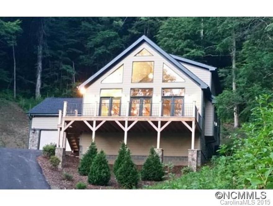 THE CRESTWOOD: Property taxes not assessed. LiveGreen Energy Certified. Wooded homesite w/mountain views.  Large open deck. Open floorplan w/cathedral ceiling. Stone gas-log fireplace.  hardwoods & ceramic tile on main.  Master w/spa bath and walk-in closet on main. Kitchen w/granite countops & SS appliances. Lots of wood accents throughout. Restored 1800s cabin as clubhouse.  Walking trails & fishing ponds.