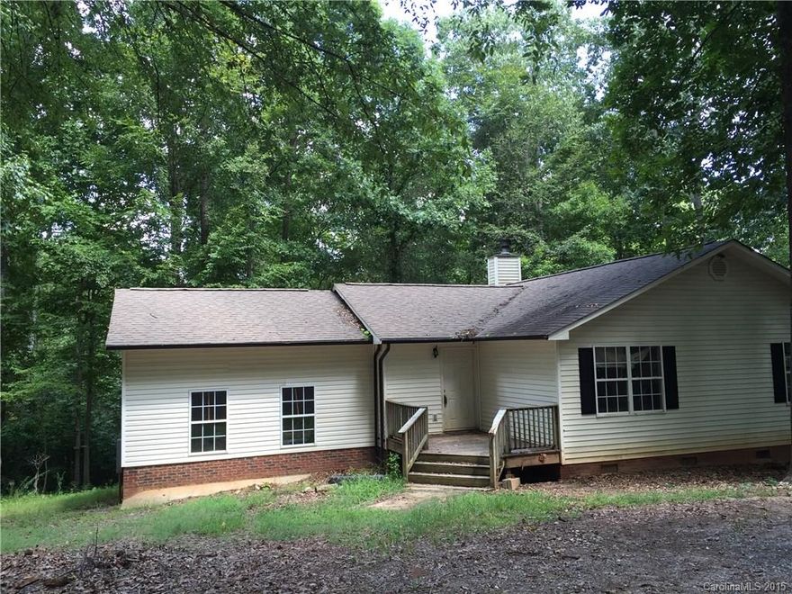 Investers ..great opportunity. This house needs work but a great opportunity for a flipper or a buyer that is willing to put in sweat equity for acreage and privacy. Excellent location. Hard to find  10.864 acres in an area close to schools and shopping. Fishing stream borders property. Sold as-is.