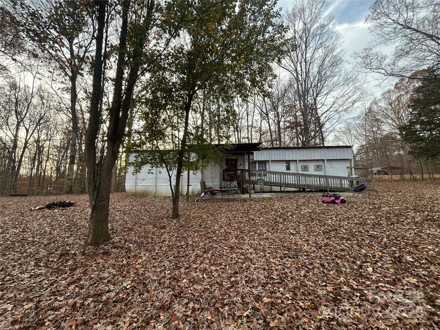 Back on Market! Prime Investment Opportunity! This property presents an excellent opportunity for an investor seeking immediate income and long term potential. An established tenant is already in place, making this a turnkey addition to your portfolio. In addition, to the main property, an additional 0.51 acre lot is included, bringing the total to 1.47 acres, providing added space and potential. Ideal for investors or buyers looking for extra land for recreational use or storage. Per recent soil evaluation, the additional lot did not support a septic system. Buyer to verify any future use or alternative options.