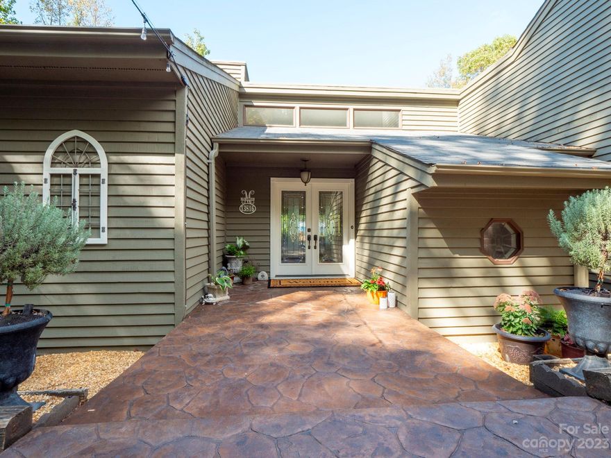 Lovely lakefront home with delightful views of Lake Wylie from most every room! 2-story Great room w/ a beautiful rock fireplace, expansive windows and picture perfect views. Deck access from every bedroom, you'll enjoy relaxing on one of the back decks with your favorite book, beverage, music, and a tranquil water view! Primary bdrm on the main flr with ensuite bathroom. Laundry room located on the main flr and could be used as a drop zone just inside the garage entrance. Kitchen has lots of storage and convenient breakfast area. Dining room located between the kitchen and great room has large windows overlooking the water. Downstairs in the walkout basement are two bdrms and one full bth. A Large rec room. A private floating dock and covered boat slip on a quiet cove opening to the main channel.  On 1.29 acres, w/ private wooded road. No HOA fees. Newly painted exterior. Agent owned. Enjoy your own private lake get away yet live close to shopping, dining, uptown, & airport.