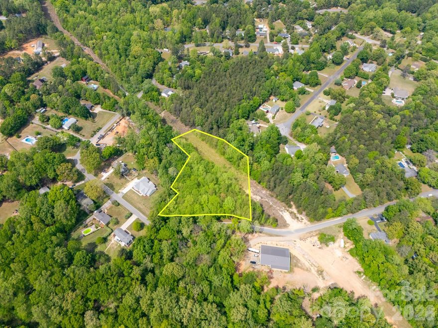 Beautiful 2.92-acre property with 369 feet of road frontage.