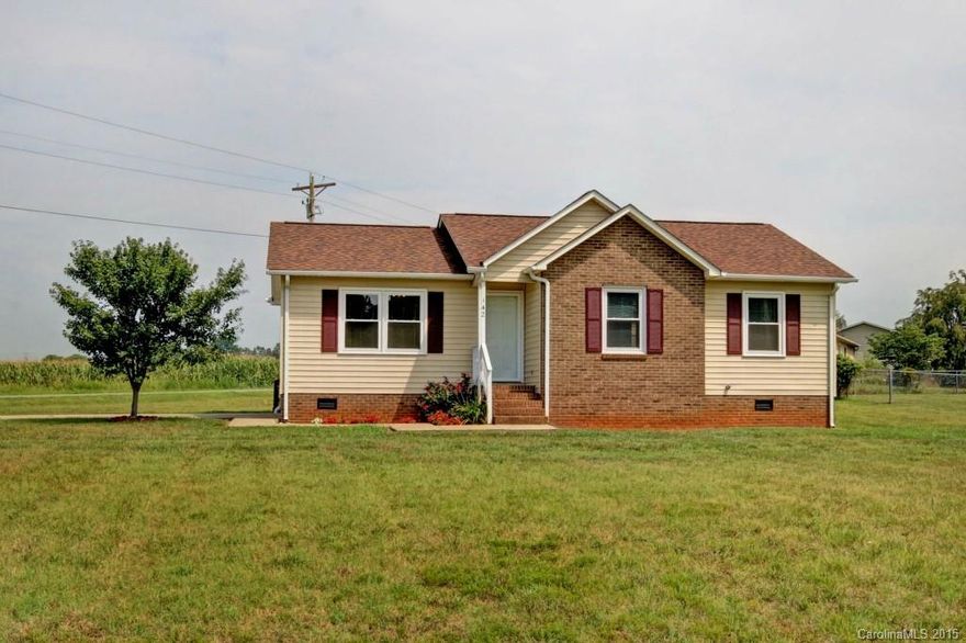 Great starter or investment property in great condition.  New roof 2009, newer appliances, new windows, freshly painted throughout, new carpet, wood flooring in living room.   Corner lot with large deck to enjoy rural living and the Statesville Balloon Festival.   16x16 2 story shed would be great storage or workshop.  Quiet community close to airport, Lakewood Golf Course, Troutman and downtown Statesville.