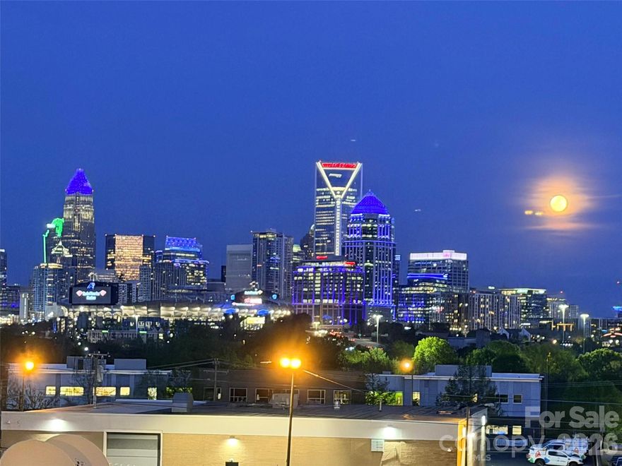 AMAZING UPTOWN VIEWS from your rooftop balcony! This is a former builder's Model Home with all the upgrades that come with it. Featuring upscale finishes such as 7-inch plank hardwood floors throughout, dark gray upgraded cabinets, quartz countertops, stainless steel appliances, soft close cabinets, distinctive lighting & more! Live in the heart of Charlotte’s dynamic FreeMoreWest neighborhood adjacent to the Legion Brewery, within walking distance of dozens of restaurants and shops along West Morehead and just 1 mile from Uptown, close to greenways and parks, dog park in the community.
