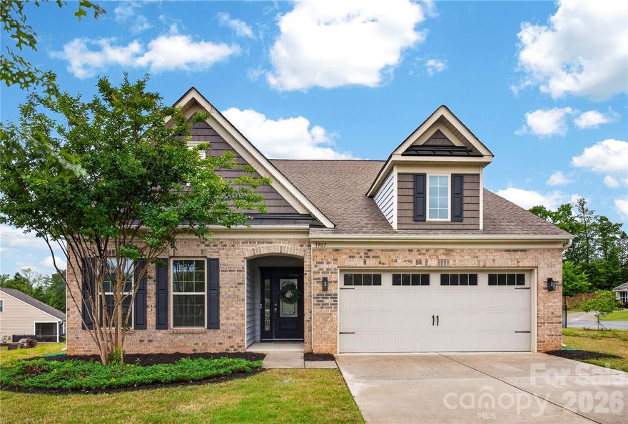 Welcome to this beautiful home located in the Cortona subdivision, just 10 minutes from charming downtown Waxhaw dining, shopping, and entertainment. Perfectly situated directly across the street from the community fitness center, this home offers both convenience and lifestyle right at your doorstep.

Designed for modern comfort, the home features an EV charging station and a backyard built for entertaining. Enjoy outdoor gatherings with the built-in grill and spacious patio area, ideal for relaxing evenings or hosting guests. Inside, you’ll find a functional layout with generous living spaces, abundant natural light, and stylish finishes throughout.

Offering the perfect blend of location, amenities, and everyday luxury, this is a home you won’t want to miss!