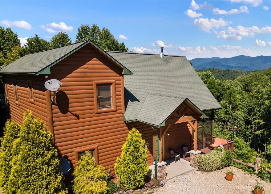 Back on the market due to no fault of the seller.  EARNING POTENTIAL!! THIS BEAUTIFUL HOME HAS A PROVEN TRACT RECORD AS AN INCOME PRODUCER! Home has earned 70K in yearly rental fees since 2021. Meticulously maintained 3bd/2ba home with cathedral and planked ceilings, new appliances, new bedroom flooring and HVAC system. Take in the  great view while sitting on the screened in porch. Enjoy the hot tub, lounge and relax or read a book  in the peaceful portico swing.  Enjoy an evening fire, roasting marshmallows and creating memories that will last a life time. The perfect get away, that has the potential to pay for itself, what an amazing opportunity this home holds. Home sold furnished.