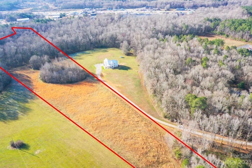 Gorgeous 9 acre parcel with a mix of woods and flat pasture land.  No HOA, and no deed restrictions; build that home you've been dreaming of!  Perfect location for your home or homestead conveniently located only a mile from 521.  This land is located off of a private road in a growing area with all the privacy, but only minutes from shopping, restaurants, and medical facilities.