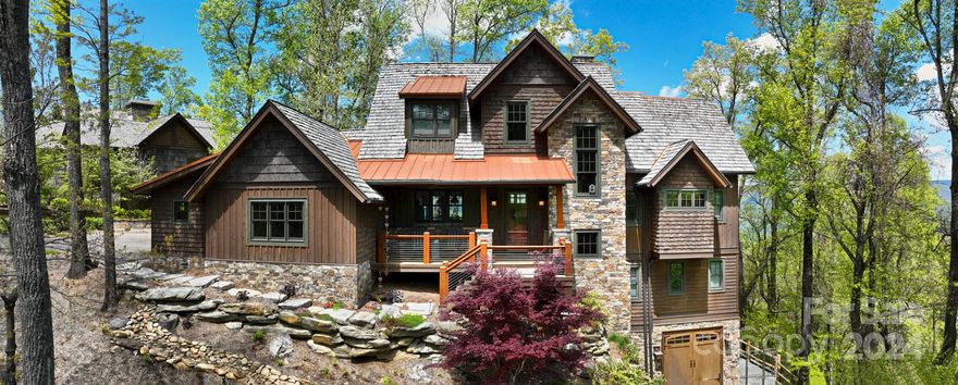 Gorgeous mountain home retreat, with amazing mountain views, available in the 6,000+ acre gated community of Blue Ridge Mountain Club! This home is being sold furnished (See furniture list attached to listing), has ample space with an open concept kitchen, dining and great room area with large rock fireplace, 4 bedrooms that all have full bathrooms attached, a bonus room on lower level as well as a kitchenette/wet bar and den area with fireplace. This home really maximizes the surrounding mountain views with a large back porch, off the main level, that features a wood burning fireplace, built-in grill and prep area, seating area and dining area, and has remote controlled retractable screens. The back porch off the lower level also has a great view and that is where you'll find the hot tub! The property has two attached garages, a 2 car garage on the main level (with a Tesla charging station) and a 1 car garage on the lower basement level with a washer and dryer and a built-in dog wash.