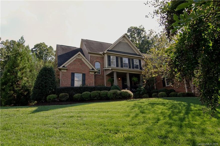 All brick, 4 BR w/master on main, 3 car gar in The Landing, Granite, HW, 2 story Great Rm, Oversized fenced backyard & open floor plan. Updated finishes & fresh paint. New carpet in Master & downstairs office. Computer nook w/2 built-in desks. Two large BR up w/Jack & Jill Bath, walk-ins, XL Bonus Rm, Lg walk-in Attic. Beautiful covered patio w/sound, firepit & built-in gas grill, Storage shed, irrigation & gorgeous landscaping! Many ammenities, Award-winning Clover schools & low SC taxes!