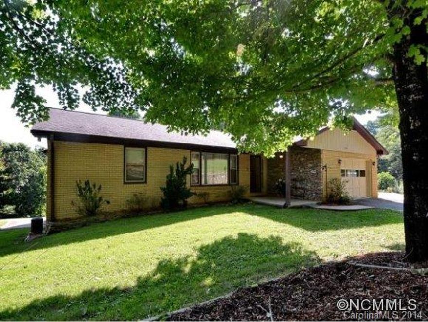 Looking for great home in a convenient location, this is the place! Home offers in-law quarters w/full kitchen, 2 bdrms, full bath, fireplace & bonus room. Main level has 3 bdrms, large master suite, dining rm, living rm, big kitchen, family rm w/fireplace. Gorgeous yard w/variety of berry bushes, 2 terraced gardens, storage shed, 420sf deck, covered front porch, loads of storage, security system & sprinkler system. Originally a group home.