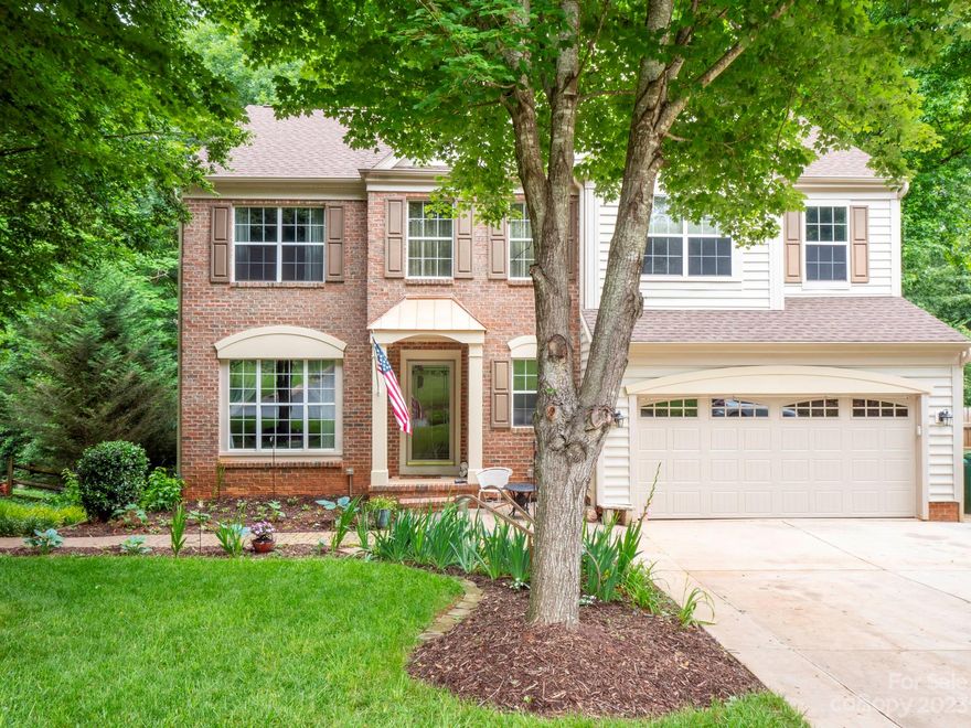 Impressive 4 bedroom, 2 1/2 bath home in the sought after Fort Mill area.  Kitchen with island, pantry, and built in charging cubbies/desk. Breakfast area has French doors that open to a newly expanded 12x24 deck.  Family room has fireplace with gas logs.  Primary bedroom has walk-in closet that could be used as a nursery, craft room, or sitting room.  Primary bath with garden tub, separate shower, dual sinks, vanity, and walk-in closet.  Laundry upstairs.  Finished walk-out basement has room for family gatherings or could be a man cave and storage room that can be used as a workshop with plumbing for future bathroom.  French doors open to a large paver patio, semi-private wooded back yard with fire pit, shed with electricity, and hot tub.  2 car garage with new insulated garage door, double lane expanded driveway.  Neighborhood has walking trails to area parks.  Just minutes from Charlotte, Indian Land, Rock Hill, I-77, & Fort Mill schools.  Schedule showing today!