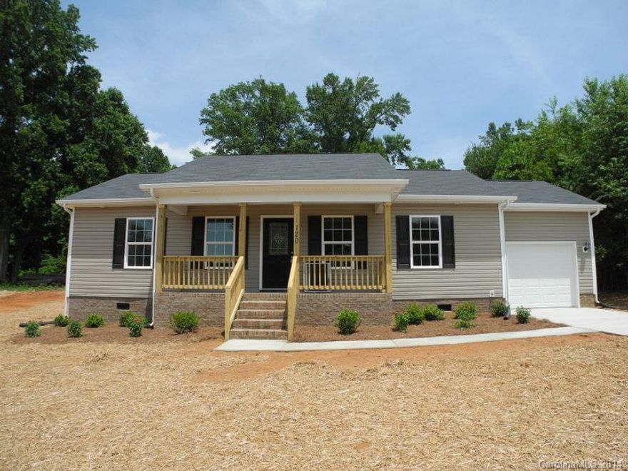 Here it is, New Construction at an affordable price! There isn't much new construction out there & this one was worth the wait! Open floor plan w/ split bedroom plan & laundry room, huge pantry & large closets. A patio for the evenings & a nice front porch  for morning coffee. By using a USDA loan, financing the list price your monthly payments are $830 a month, incl taxes & insurance 4 % fixed rate ( 4.98 % APR) for 30 yrs. I can't find a rental at that price, much less your OWN BRAND NEW HOME!